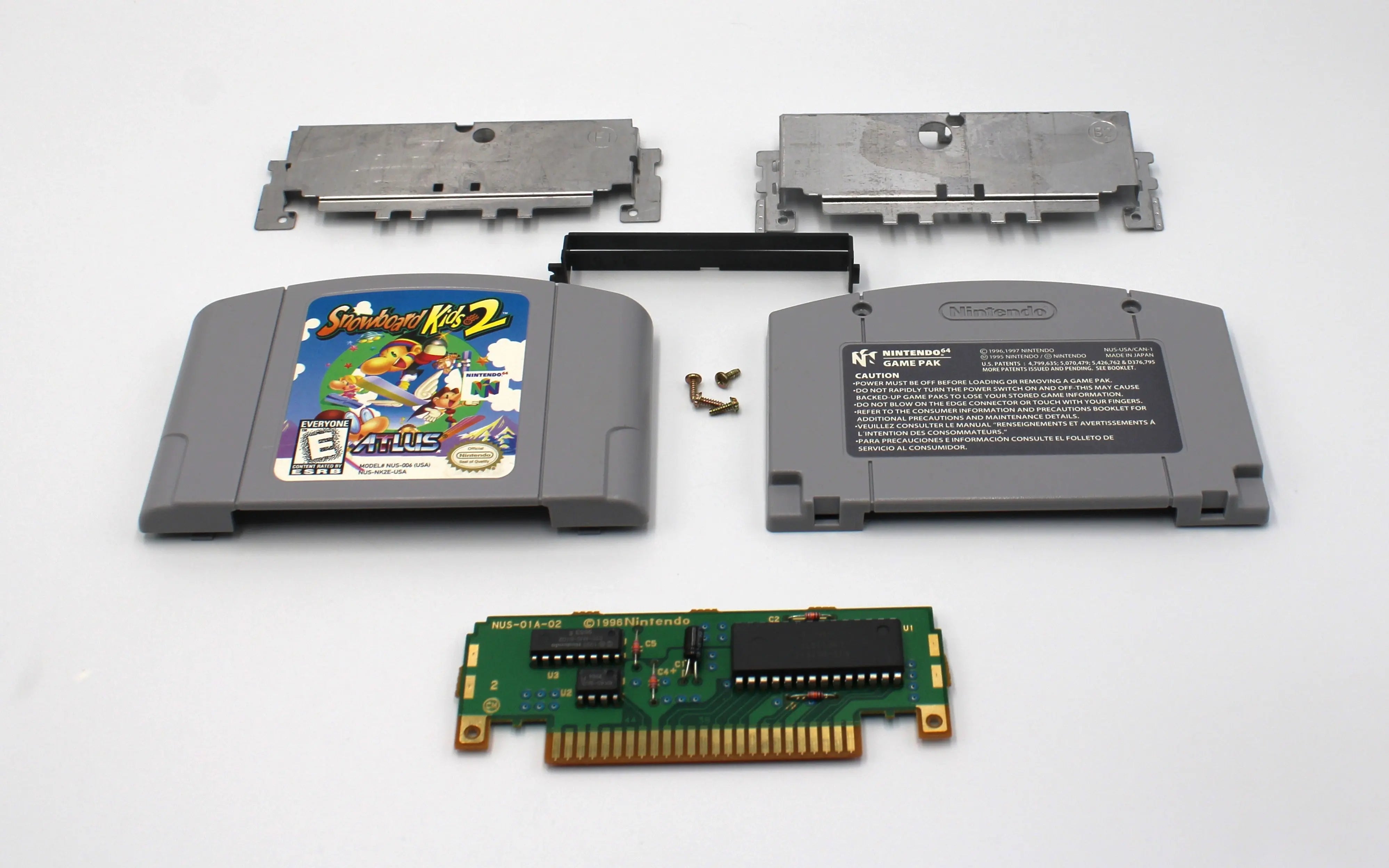 Shop online for authentic NTSC copy of Snowboard Kids 2 for the Nintendo 64, N64.  Michigan based. Refurbished. See picture of cartridge disassembled. See shell, plates, screws, and game board.