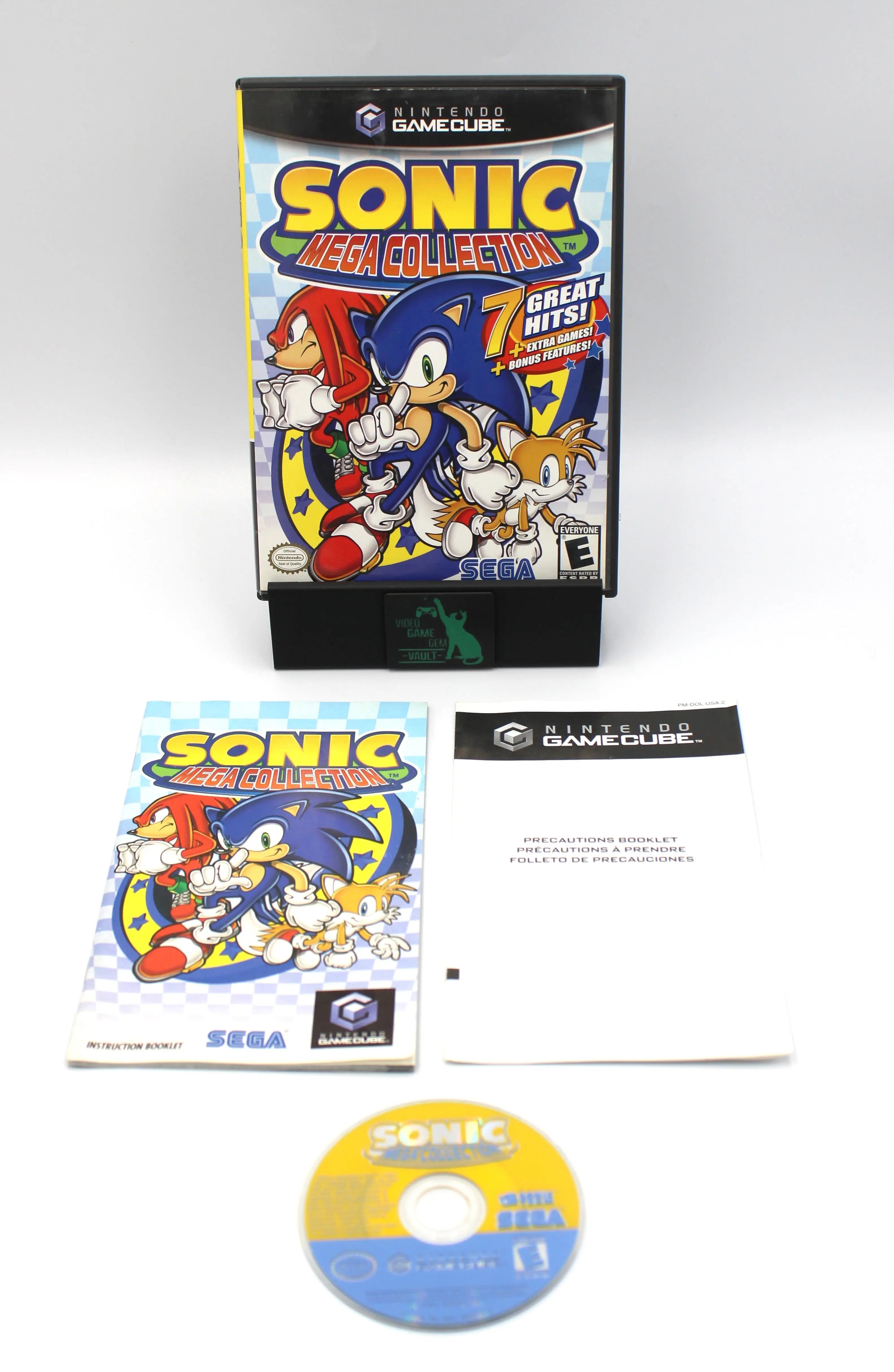 “Main display of Sonic Mega Collection for Nintendo GameCube – NTSC‑U black label CIB with Manual (2002), showing the game case and instruction manual arranged on a white background.”