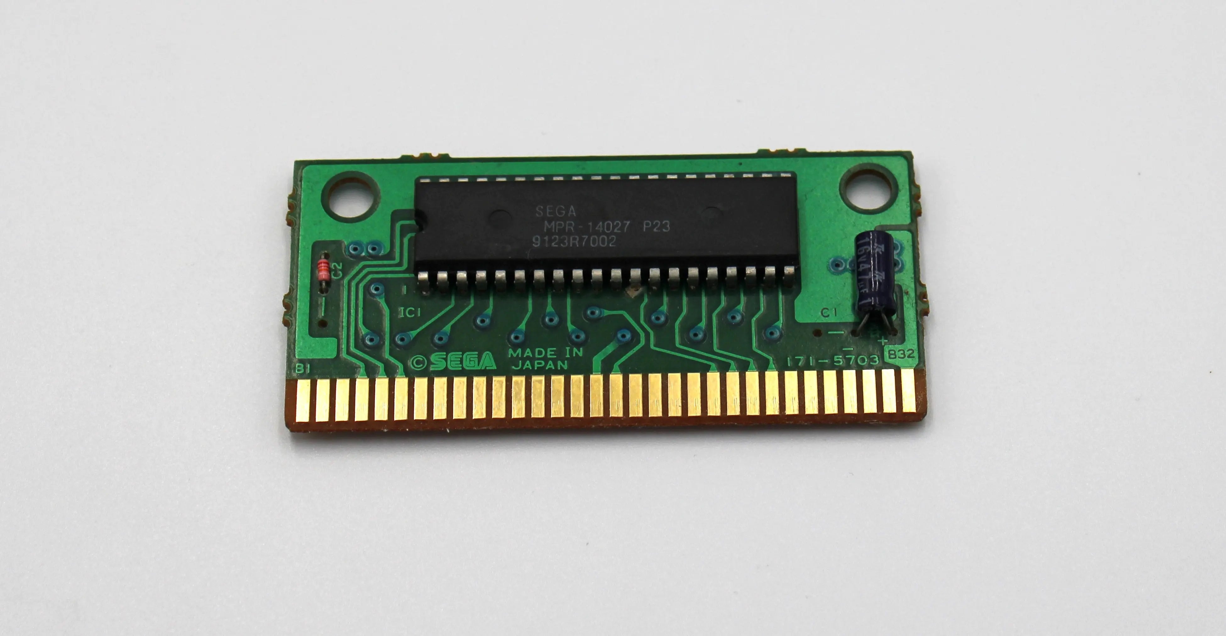 Internal board front of Spider‑Man for Sega Genesis – Authentic Game Cartridge (1991), showing the Sega ASIC chip, battery holder (if present), and solder points with clear Sega etching.