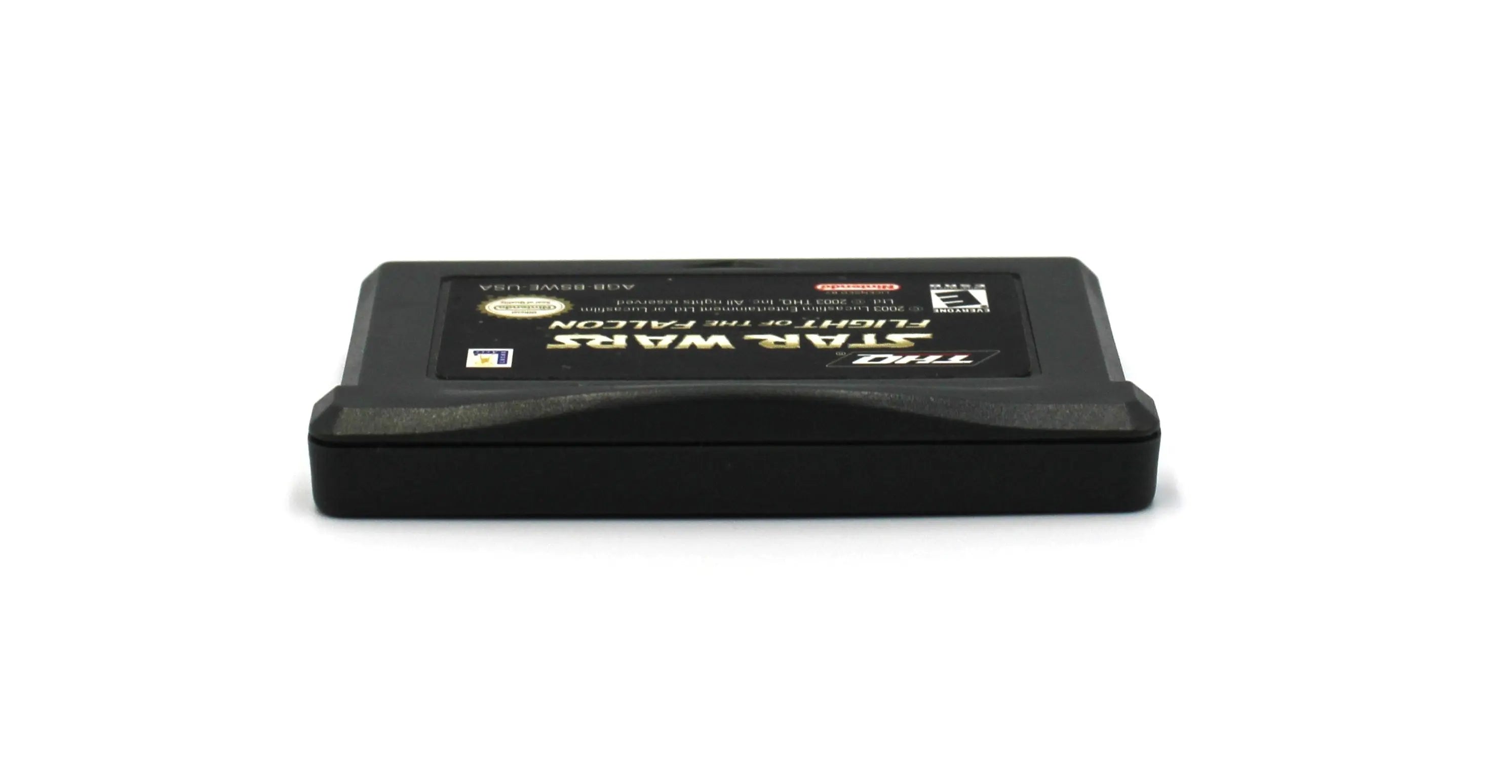 Top edge view of Star Wars: Flight of the Falcon for Nintendo Game Boy Advance GBA – Authentic Game Cartridge (2003) NTSC‑U, showing clean alignment of shell halves and label edge.