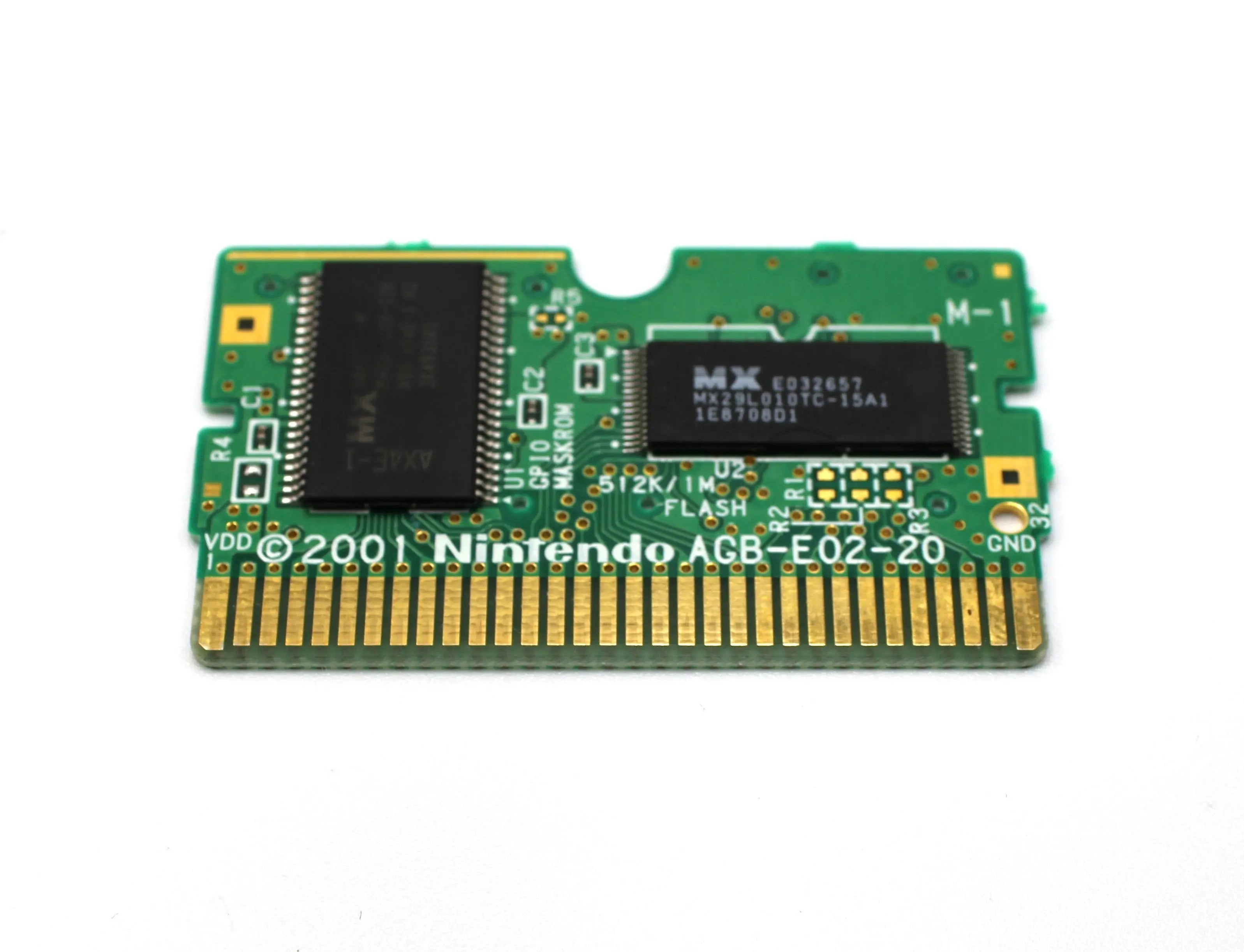 Internal board view (front side) of Super Mario Advance 4: Super Mario Bros. 3 for Nintendo Game Boy Advance GBA – Authentic Game Cartridge (2003) NTSC‑U, showing chip layout, solder points, and Nintendo etching.