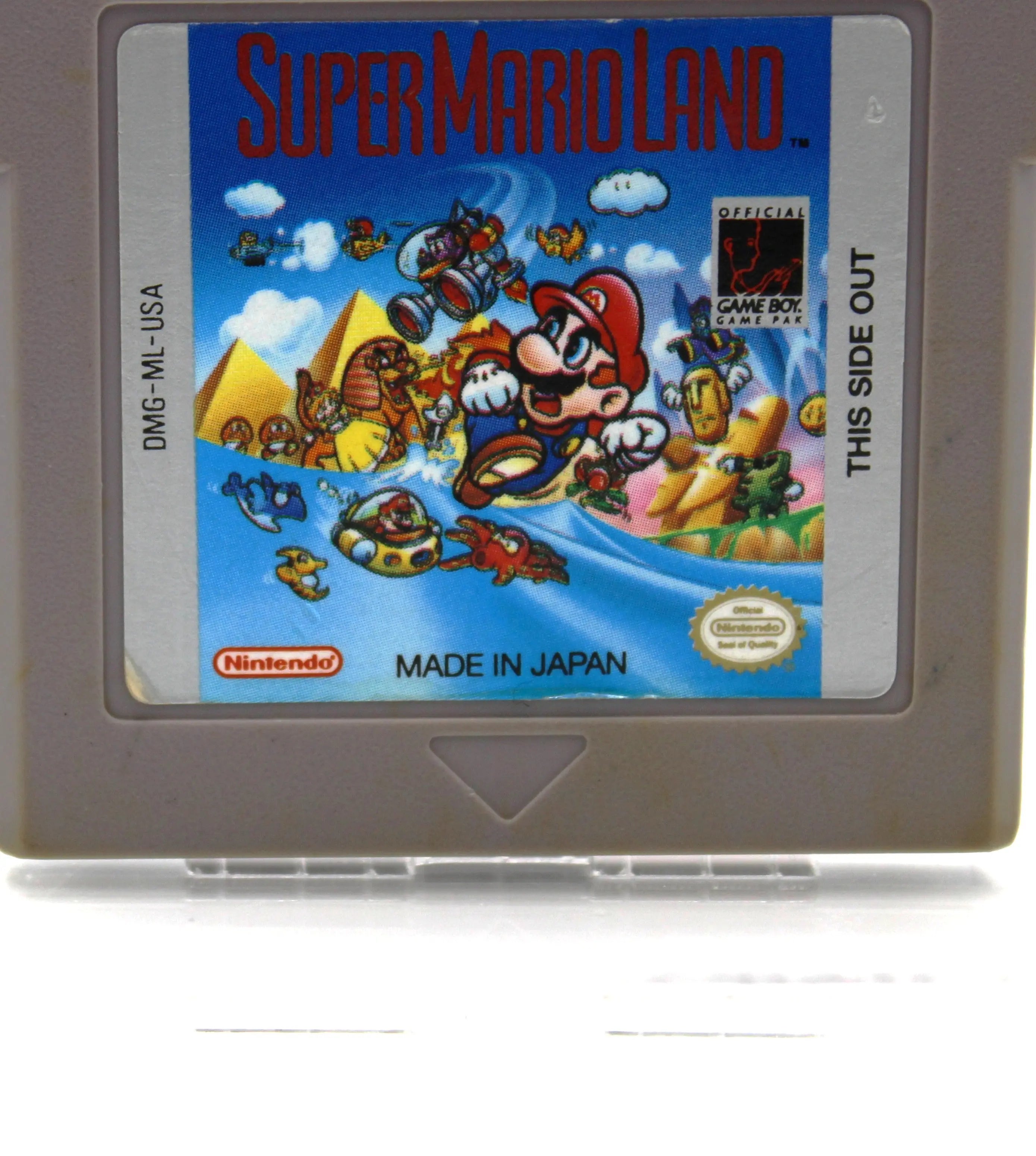 Up close front label and edges view of Super Mario Land for Nintendo Game Boy – Authentic Game Cartridge (1989) NTSC‑U, displaying the intact label with a small minor peel to the bottom left corner and moderate yellowing to cartridge sides and bottom.