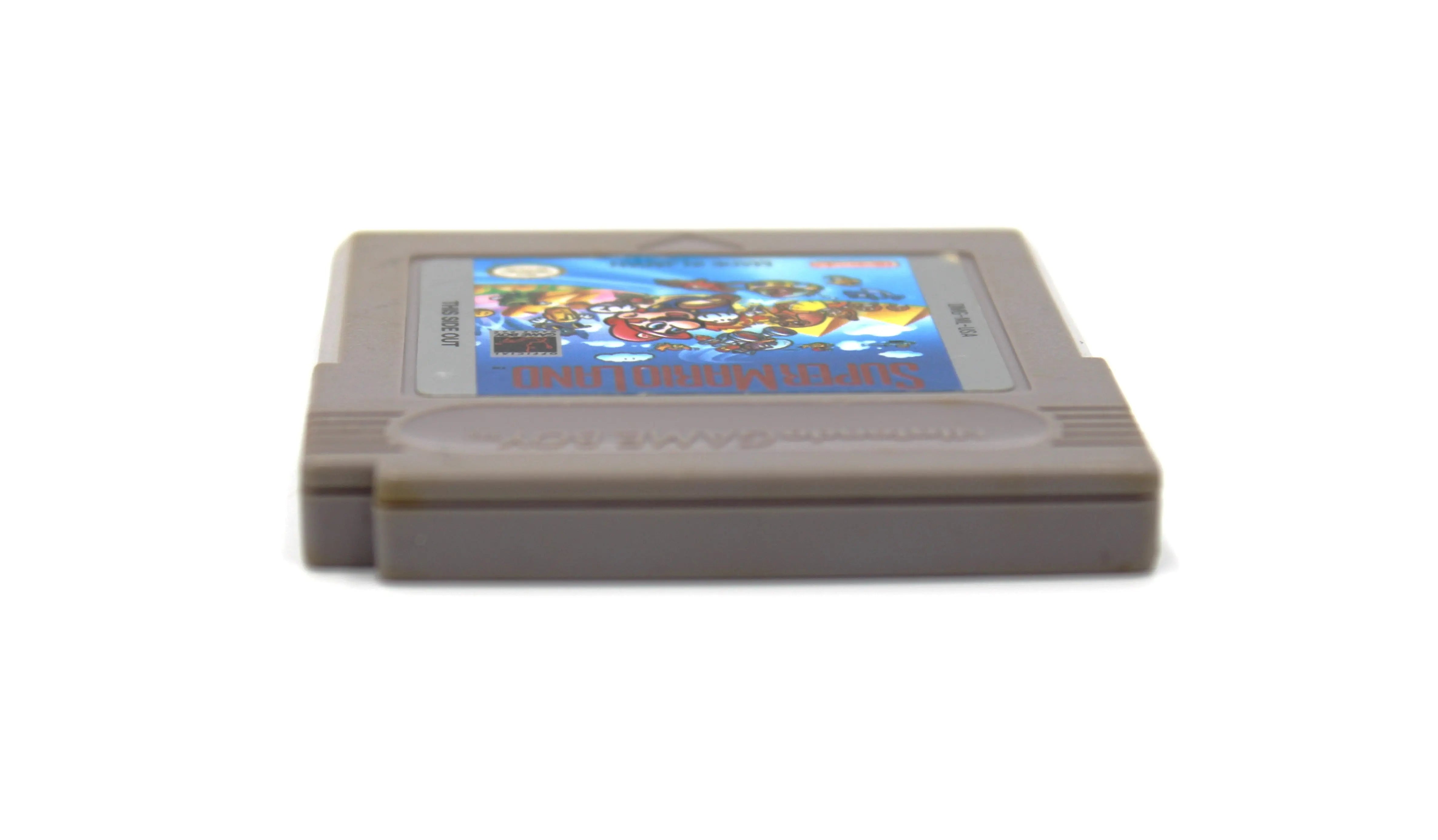 Top edge view of Super Mario Land for Nintendo Game Boy – Authentic Game Cartridge (1989) NTSC‑U, showing the clean alignment of shell halves and the top edge of the label insert.
