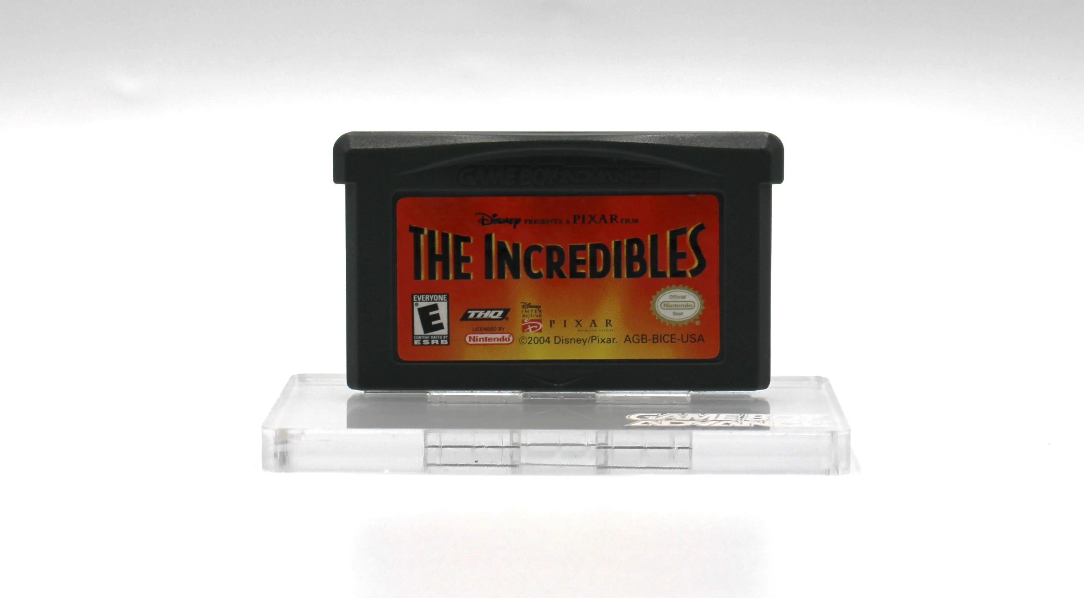Front shell view of The Incredibles for Nintendo Game Boy Advance GBA – Authentic Game Cartridge (2004) NTSC‑U, showing label condition and authentic molding details including authenticity stamp.