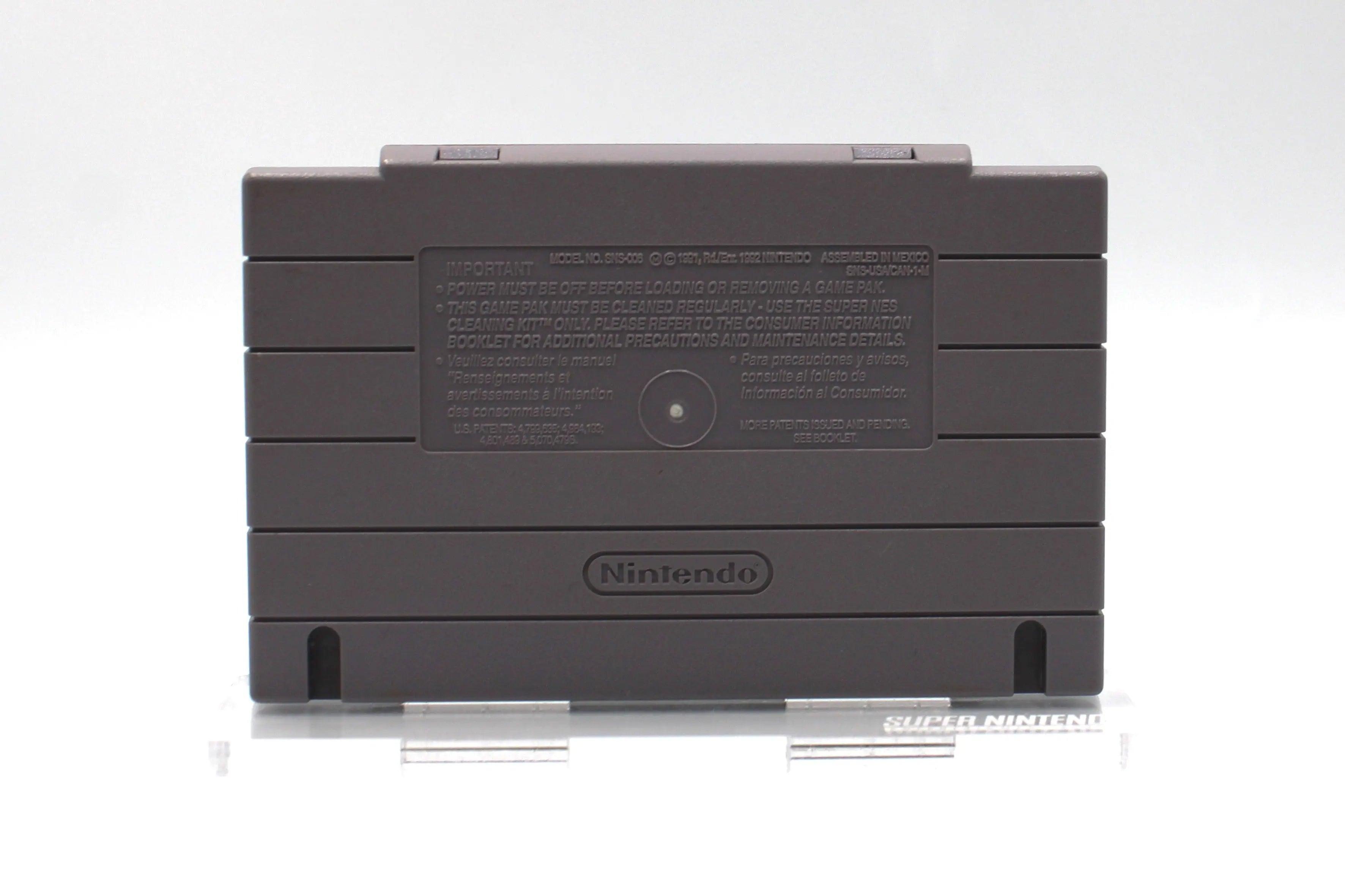 Back of cartridge for Tom and Jerry for Super Nintendo SNES (1993) NTSC-U, displaying molded text and condition