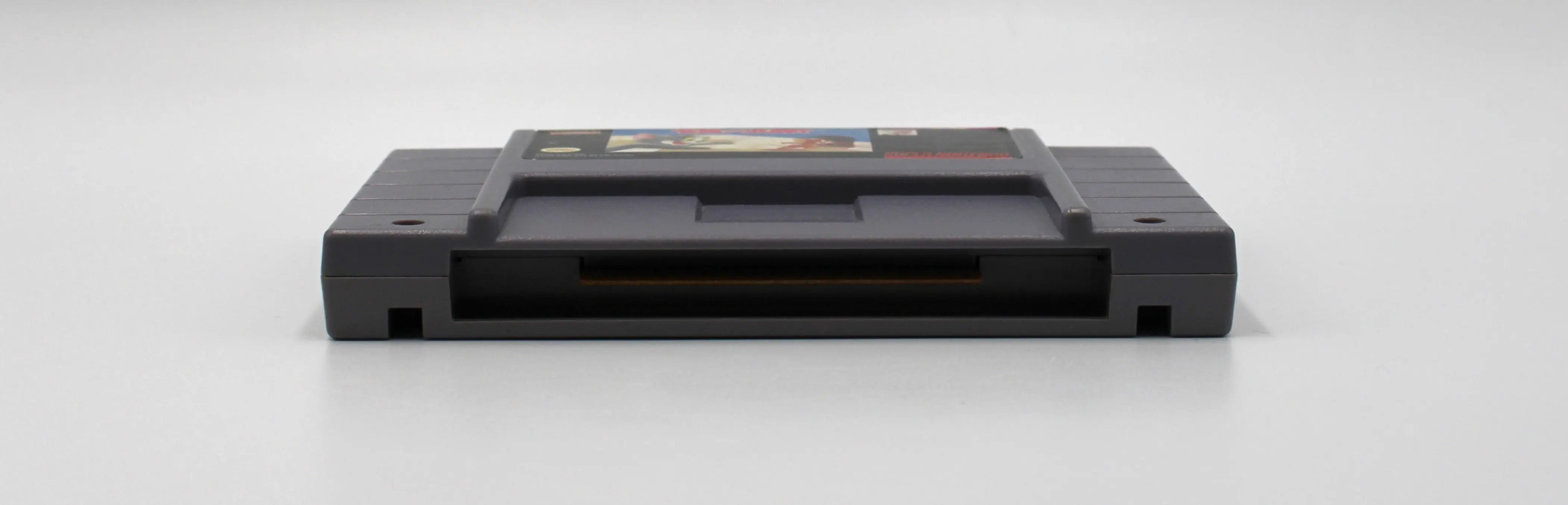 Bottom of Tom and Jerry for Super Nintendo SNES (1993) NTSC-U, showing cartridge pins and clean contacts