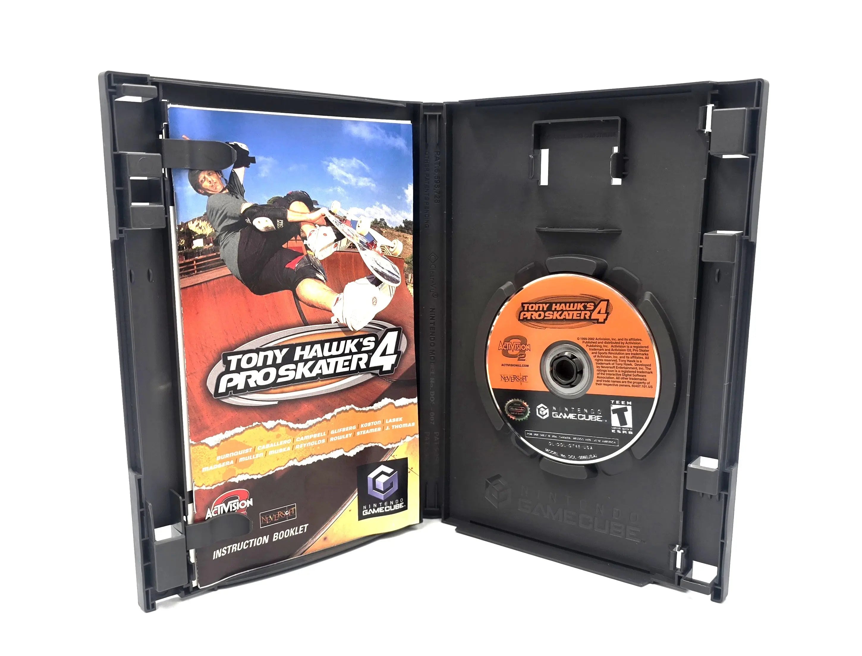 Open case view of Tony Hawk’s Pro Skater 4 for Nintendo GameCube NTSC-U complete in box, showing instruction manual and game disc secured in a Nintendo GameCube original OEM clean case.