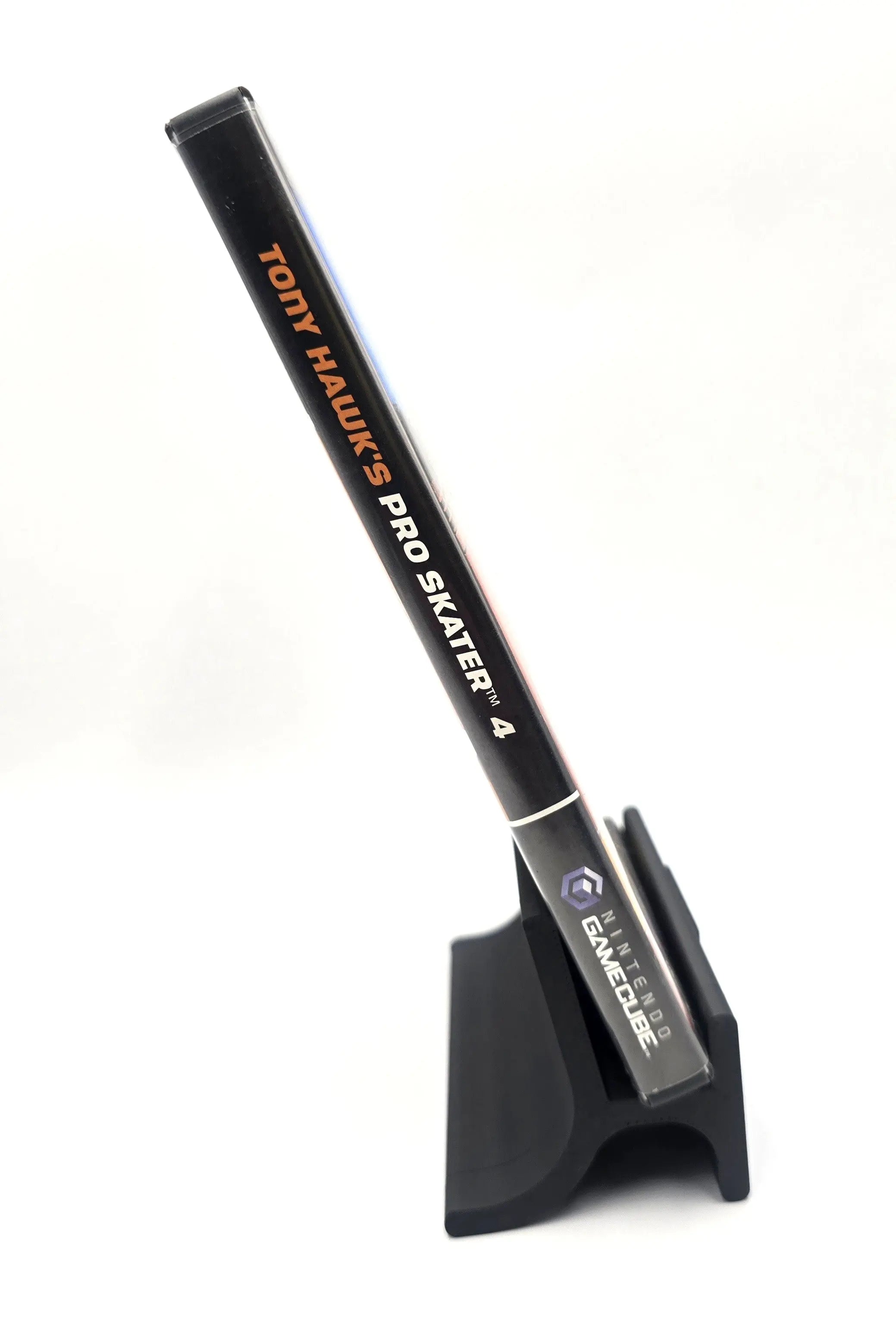 Spine view of Tony Hawk’s Pro Skater 4 Nintendo GameCube NTSC-U CIB with game title and Nintendo GameCube logo. Black Label.