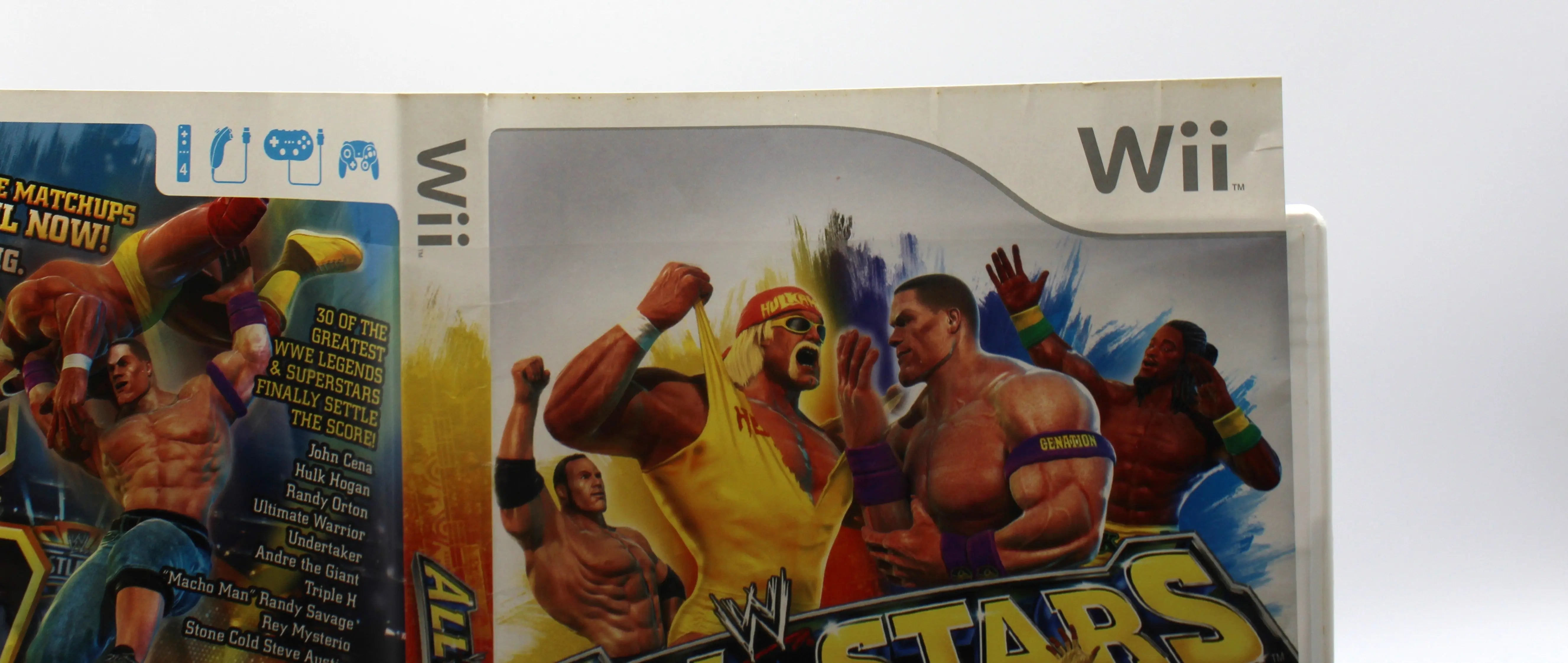 Top of front of authentic artwork of WWE All Stars for Nintendo Wii – CIB with Manual (2011) NTSC-U, showing minor wear such as creasing.
