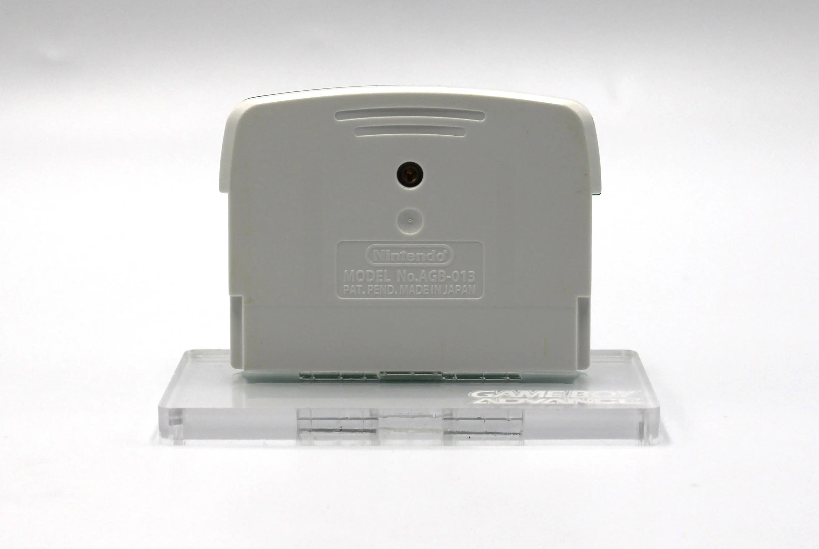 Back shell view of Yoshi Topsy‑Turvy for Nintendo Game Boy Advance GBA – Authentic Game Cartridge (2005) NTSC‑U, showing authentic Nintendo stamping and screw position.