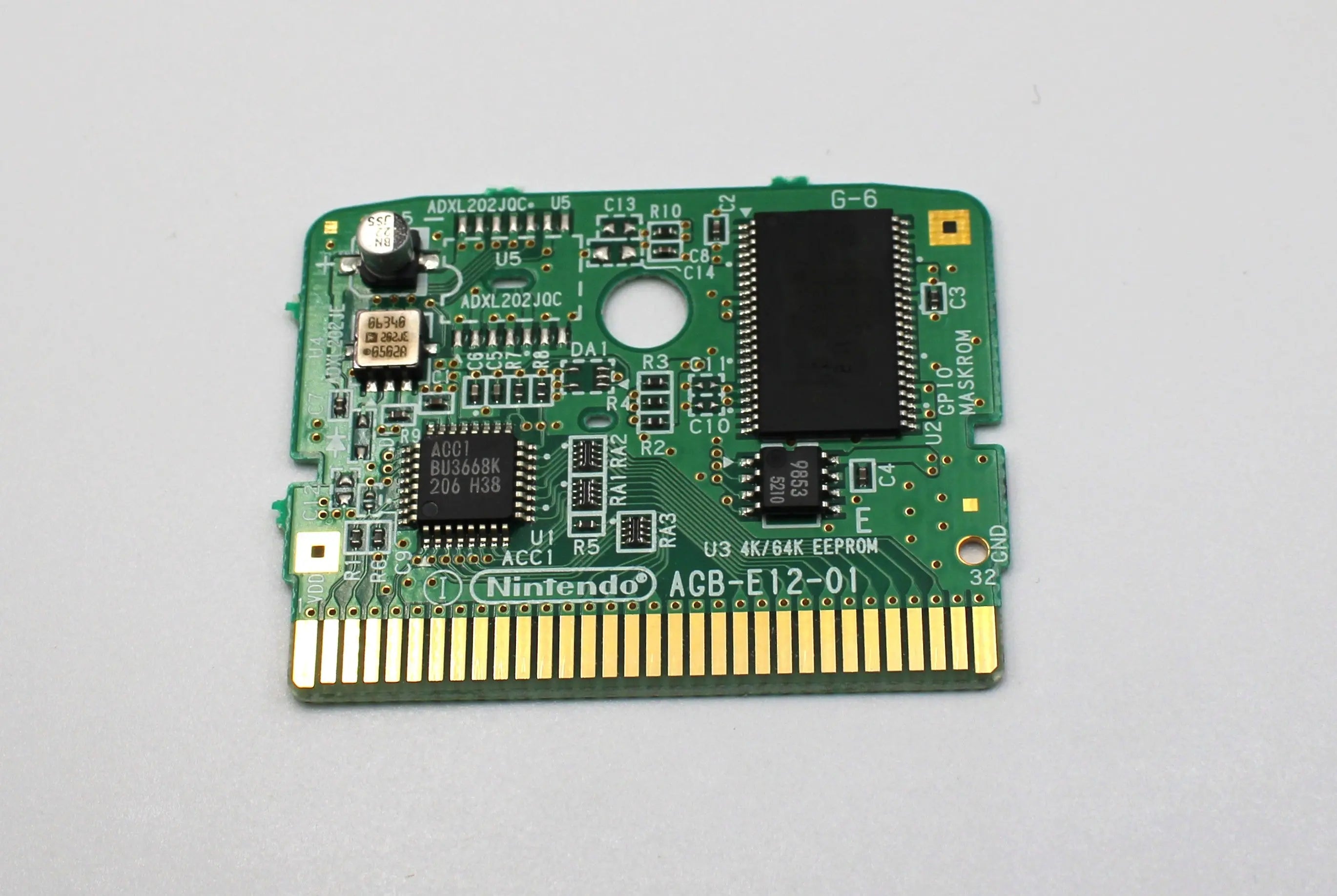Internal board view (front side) of Yoshi Topsy‑Turvy for Nintendo Game Boy Advance GBA – Authentic Game Cartridge (2005) NTSC‑U, showing chip layout, code, capacitor, and Nintendo etching.