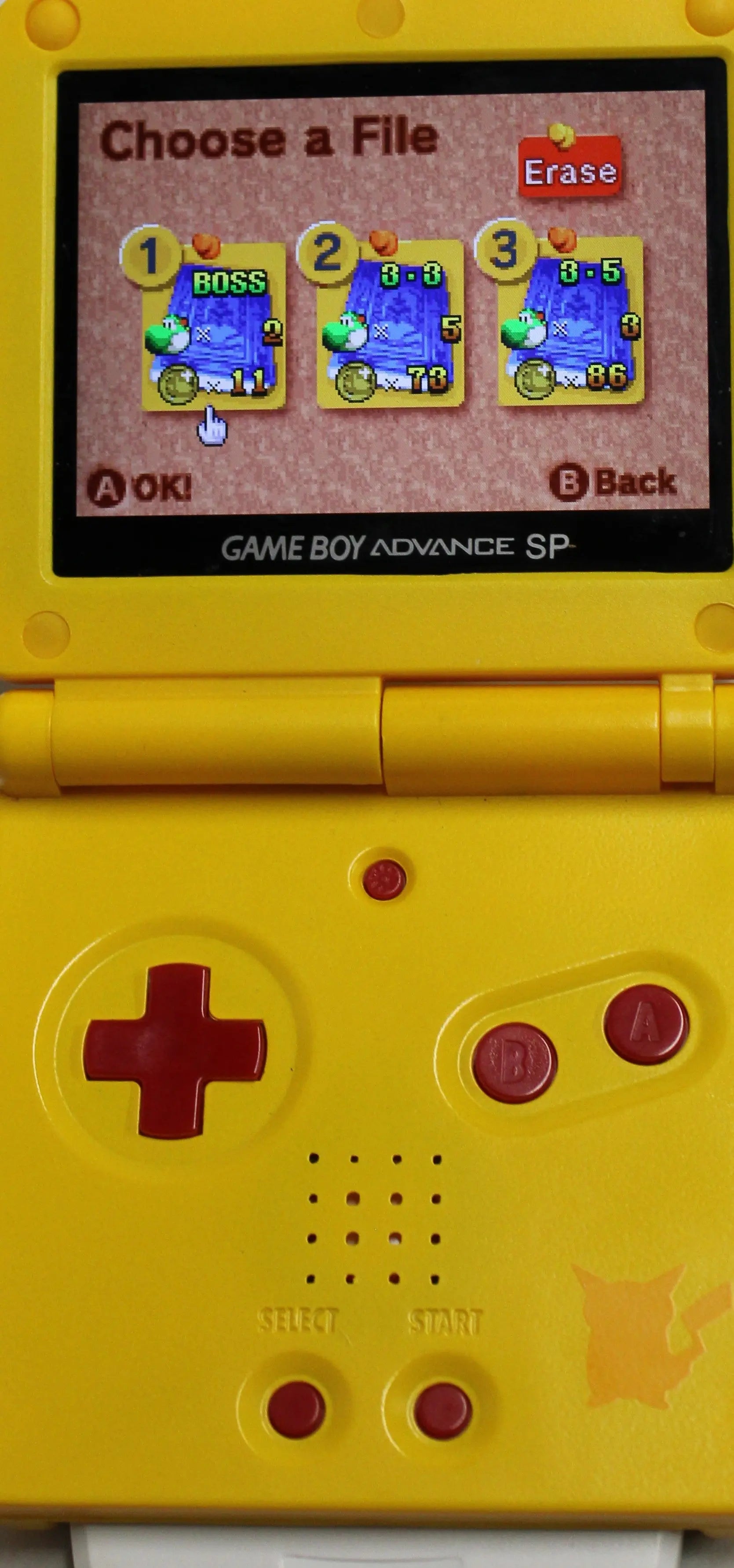 Save screen of Yoshi Topsy‑Turvy for Nintendo Game Boy Advance GBA – Authentic Game Cartridge (2005) NTSC‑U, showing the “Save Complete” prompt with Yoshi icon and file slot details.